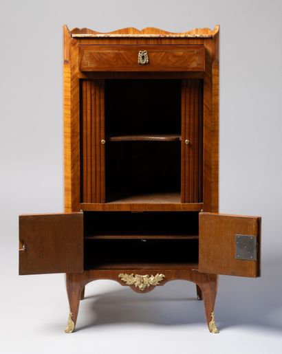 Rosewood veneer and stained wood fillets,...