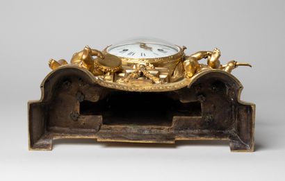 Child musician clock in chased and gilded...