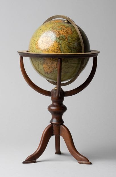 Globe 
In wood and papier-mâché, on a tripod...
