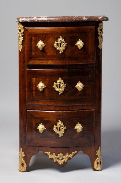 A rosewood veneered entre-deux chest of drawers...