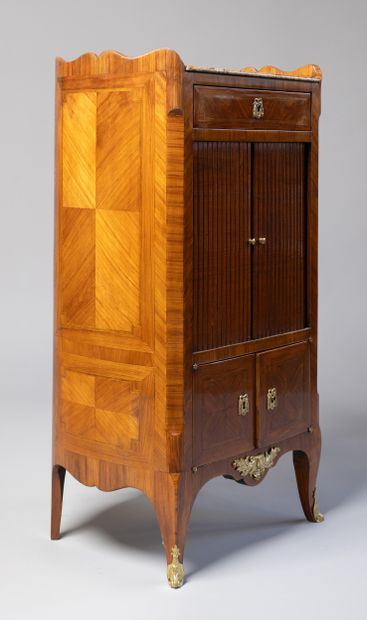 Rosewood veneer and stained wood fillets,...
