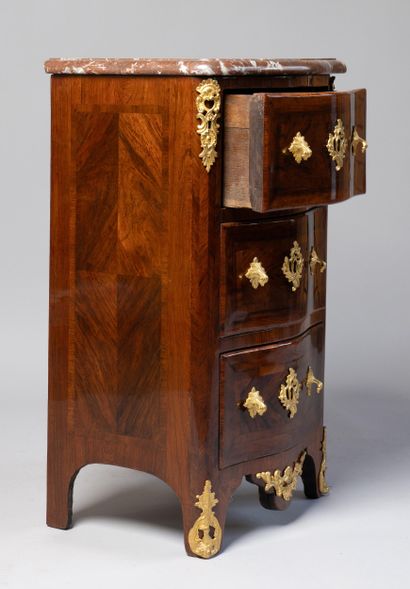 A rosewood veneered entre-deux chest of drawers...