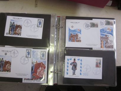 Un carton avec 10 classeurs et une boite...