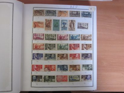 Un carton avec un album de TP des colonies...
