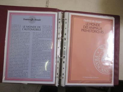 Un carton avec 10 classeurs et une boite...