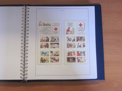 Un album et un classeur Yvert et Tellier...