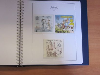 Un album et un classeur Yvert et Tellier...