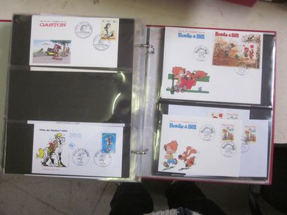 Un carton avec 10 classeurs et une boite...