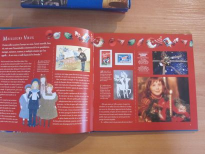 Un petit carton avec 4 livres édités par...