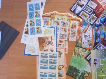 Une petite boîte avec des TP France neufs**...