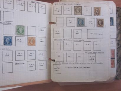 Un carton avec 11 classeurs ou albums avec...