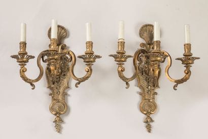 Pair of ormolu three-light sconces, the base...