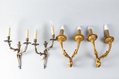 Pair of two-light arms in carved wood, formerly...