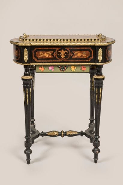 Planter with tapered legs and marquetry decoration...
