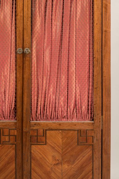 Quadrangular bookcase in rosewood veneer...