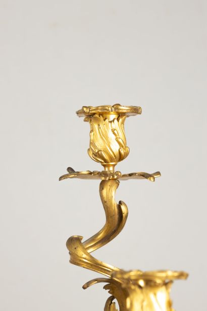 Chased bronze, gilded, patinated and red...