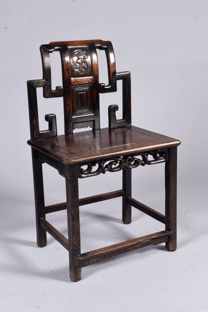 CHINA - 19th century
Wooden armchair, the...