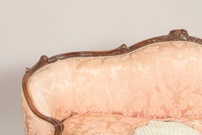 Molded and carved wooden basket sofa, decorated...