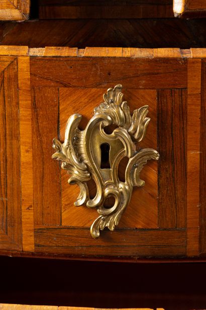 Rosewood and violetwood veneered chest of...