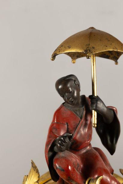 Chased bronze, gilded, patinated and red...