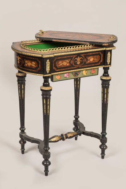 Planter with tapered legs and marquetry decoration...