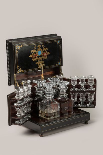 Beautiful liqueur cellar in blackened wood...
