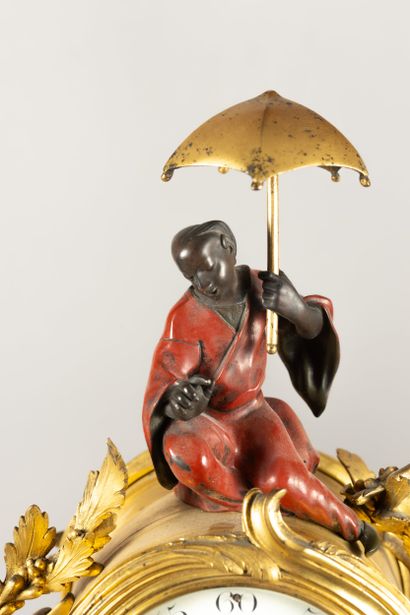 Chased bronze, gilded, patinated and red...