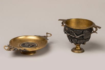 Footed bowl and a cassolette in double patina...