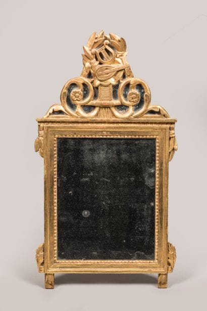 Molded, carved, stuccoed and gilded wood...