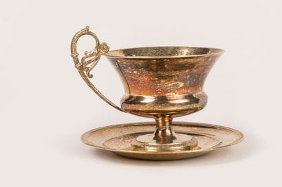 Large pedestal cup and saucer in plain vermeil...