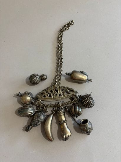 Silver-plated balanganda and articulated...