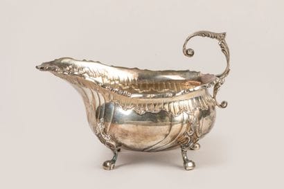 Small four-legged saucer in rocaille silver,...