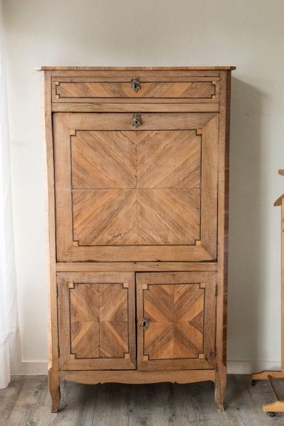 Wood veneered cupboard with flap, opening...