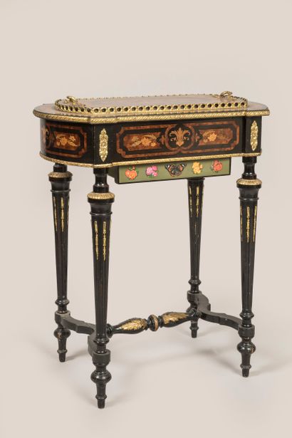 Planter with tapered legs and marquetry decoration...