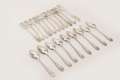 Neuf cuillères et onze fourchettes en argent,...