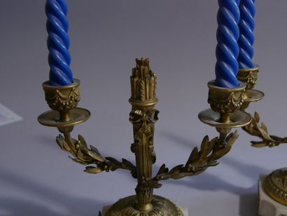 Pair of chased and gilded bronze torches,...