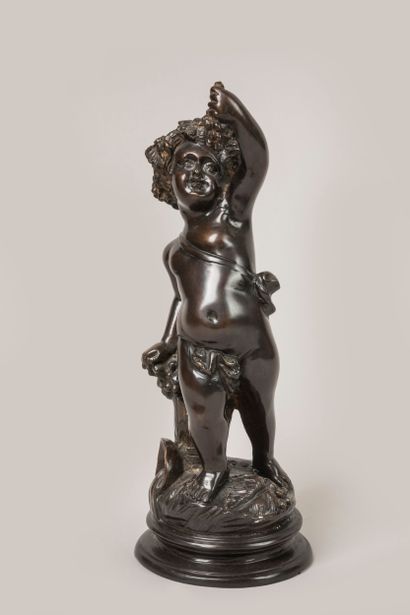 Angelot with a bunch of grapes,
Bronze with...