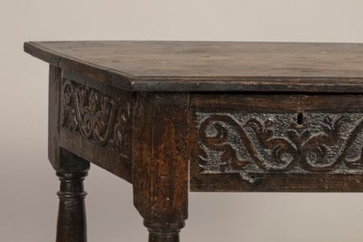 a trapezoid console, opening with a drawer...
