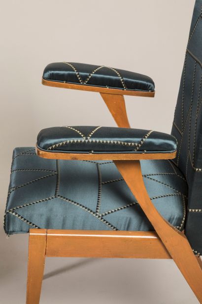 Pair of slightly tilt-back armchairs with...
