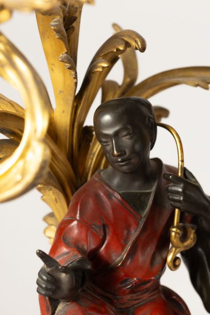 Chased bronze, gilded, patinated and red...