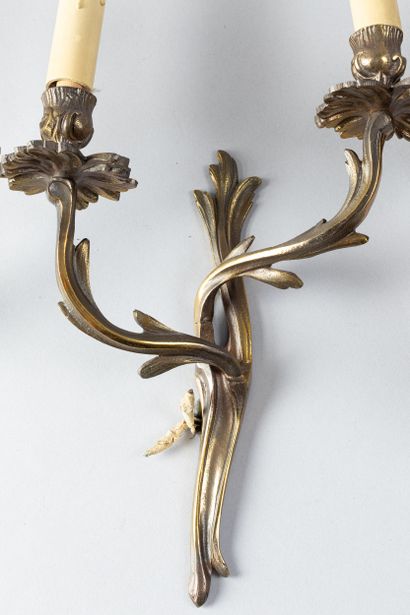 Pair of two-light arms in carved wood, formerly...