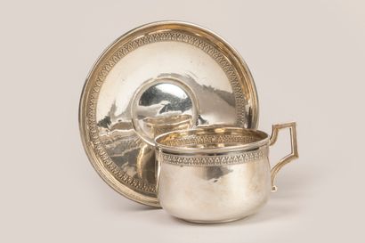Tea cup and saucer decorated with a frieze...