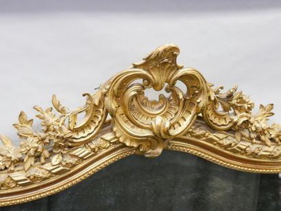 Molded, carved and gilded wooden pediment...
