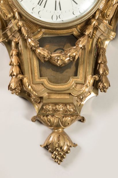 An ormolu sconce known as a cartel au ruban,...