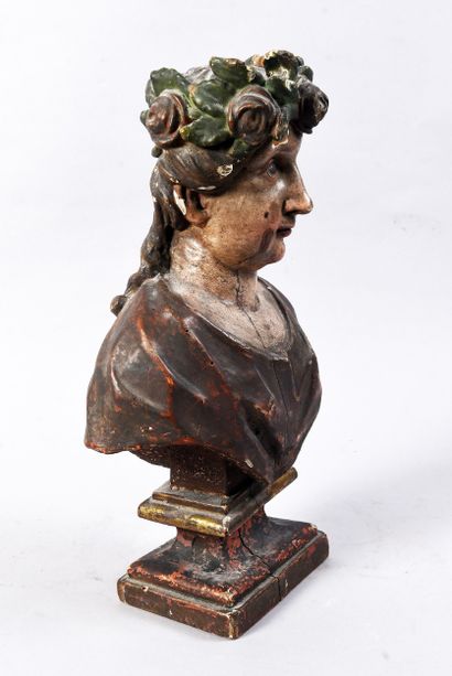 Small polychrome wooden bust of a figure...