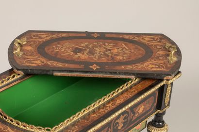 Planter with tapered legs and marquetry decoration...