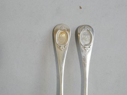 Suite of 12 silver flatware sets, the spatula...