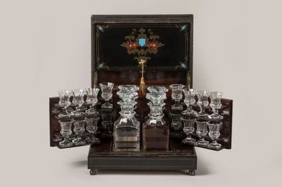 Beautiful liqueur cellar in blackened wood...