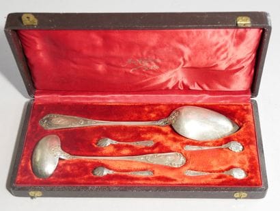 A Louis XV style silver serving spoon, cream...