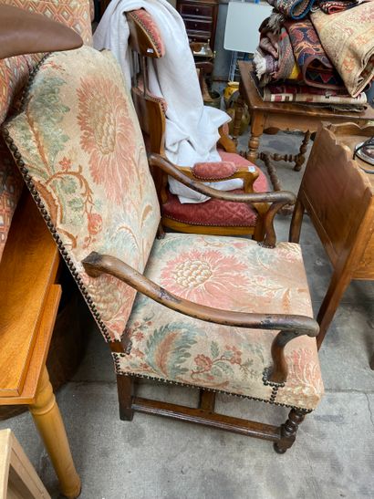 High-curved flat-back armchair in molded...